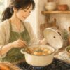 鍋で野菜スープをコトコト煮る女性