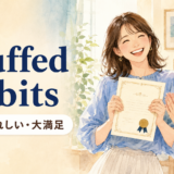 「chuffed to bits」の意味「とてもうれしい・大満足」を表すアイキャッチ