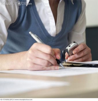 woman_transcribing_notes_from_small_tape_recorder_42-17316252.jpg